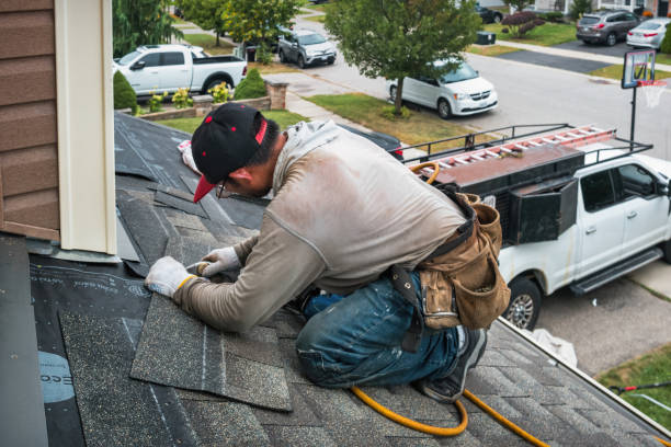Professional Roof Installation technician working in Ash, NC